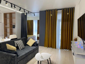 Akay-City-Gold-by 
